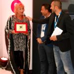 Zazie de Paris holding the Queer Lion Award 2014 trophy