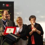 Fabio Ferzetti, Giornate degli Autori - Venice Days director, accepts the award on behalf of Ed Radtke